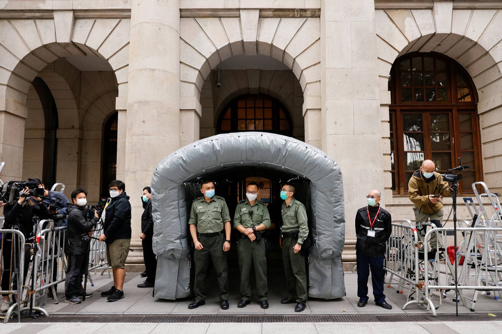 Staff of Correctional Services Department (CSD) prepare to transfer media mogul Jimmy Lai, founder of Apple Daily after bail hearing in Hong Kong