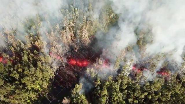 Lava emerges from the ground after Kilauea Volcano erupted, on Hawaii's Big Island