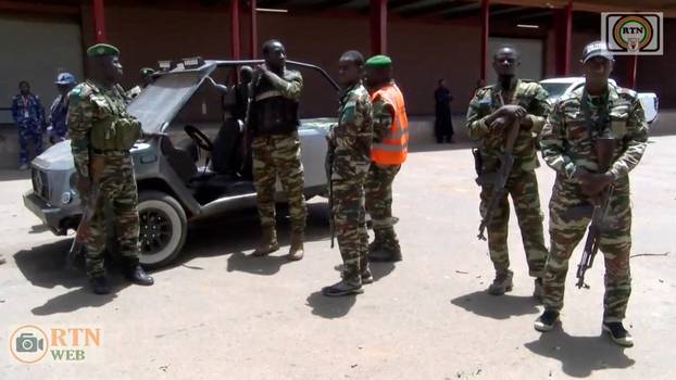 Security personnel stand guard, in Niamey