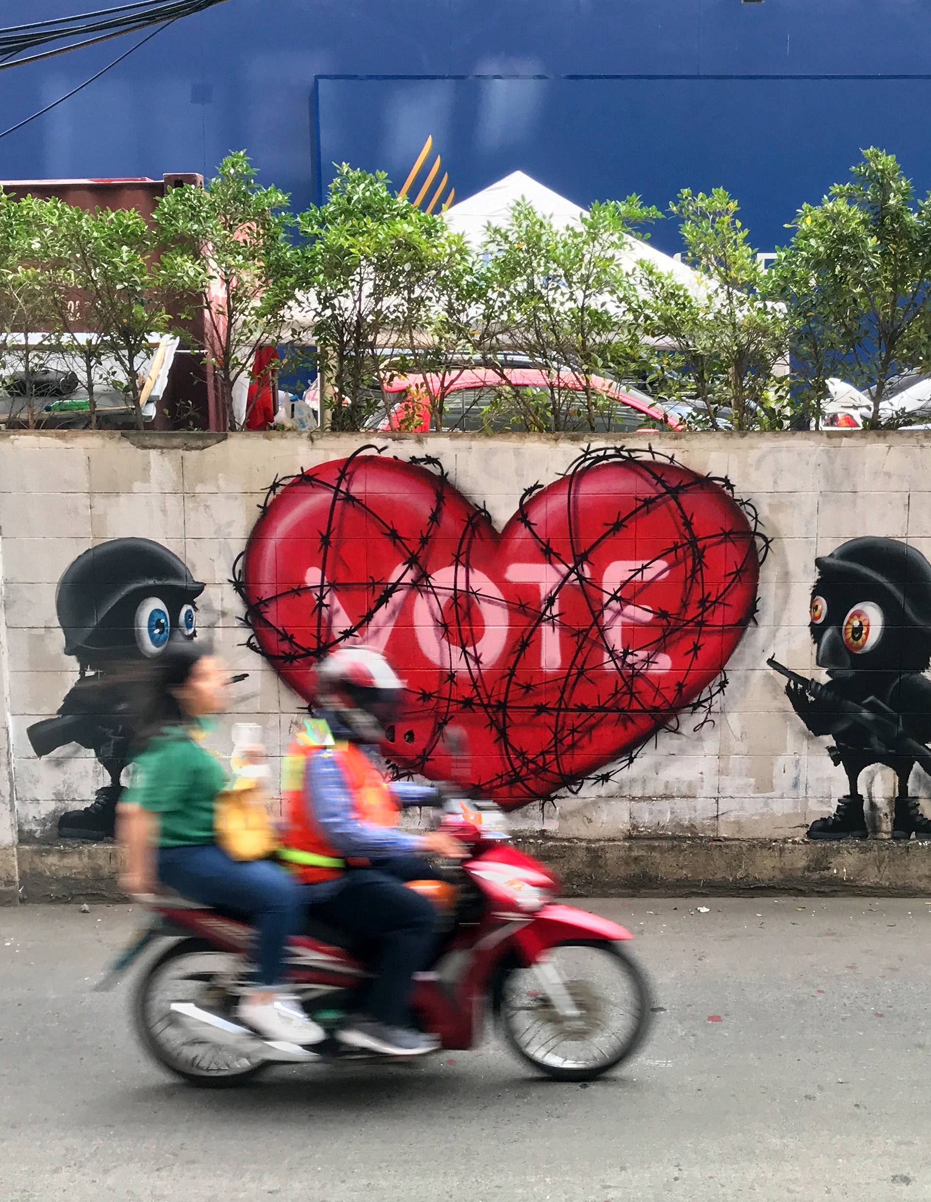 Graffiti in Bangkok against postponement of election date