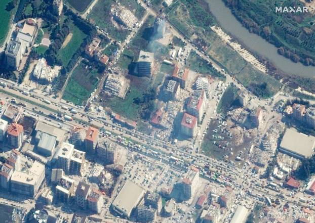 A satellite image shows collapsed buildings after an earthquake in Antakya