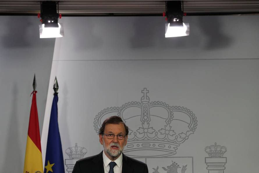 Spain's PM Rajoy delivers a statement at the Moncloa Palace in Madrid