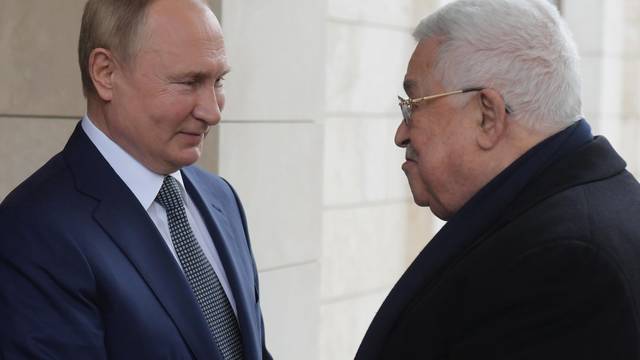 Russian President Vladimir Putin meets with Palestinian President Mahmoud Abbas in Sochi