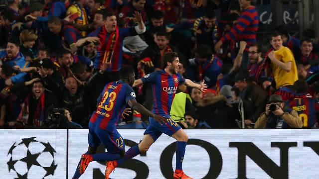 Barcelona's Sergi Roberto celebrates scoring their sixth goal with Samuel Umtiti