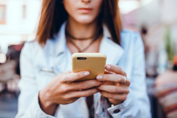 woman using smartphone