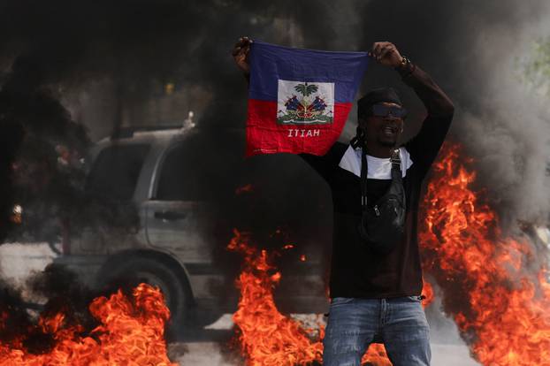 People demonstrate against the government and insecurity in Port-au-Prince