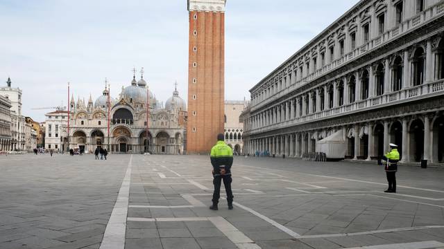 The almost empty St. Mark?s Square is seen after the Italian government imposed a virtual lockdown on the north of Italy including Venice to try to contain a coronavirus outbreak, in Venice