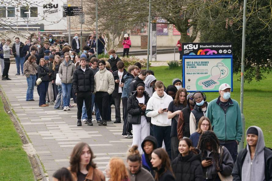 Students queuing for antibiotics outside a building at the University of Kent in Canterbury. The university have confirmed that a student was one of two people who have died as a result of meningitis in the area. The UK Health Security Agency (UKHSA) said
