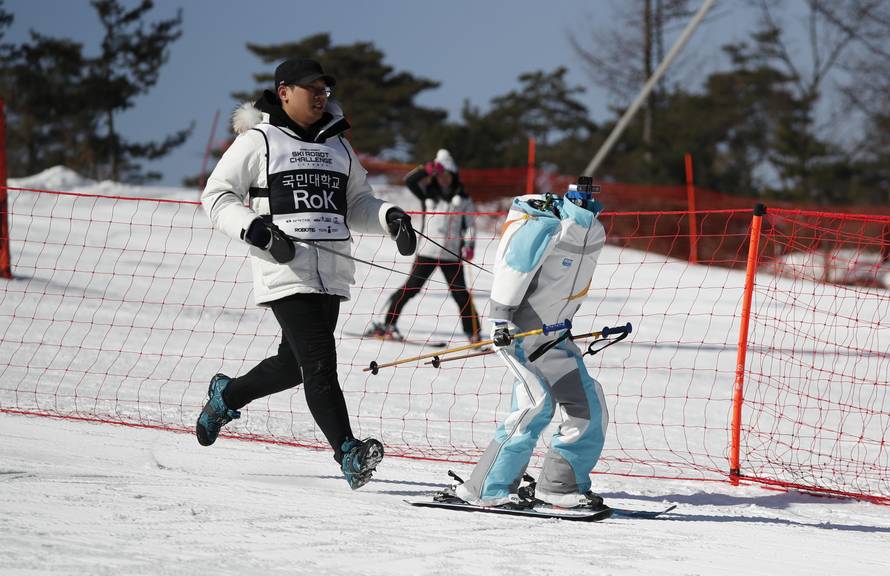 A robot skis during practice at the Ski Robot Challenge at a ski resort in Hoenseong