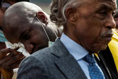 Philonise Floyd, brother of George Floyd, wipes tears after speech at the public viewing of Floyd at The Fountain of Praise church in Houston