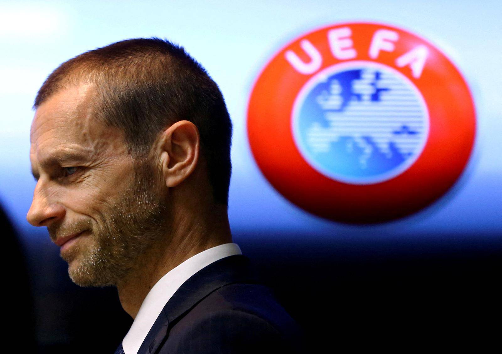 FILE PHOTO: UEFA president Aleksander Ceferin arrives at a news conference in Stara Pazova, Serbia