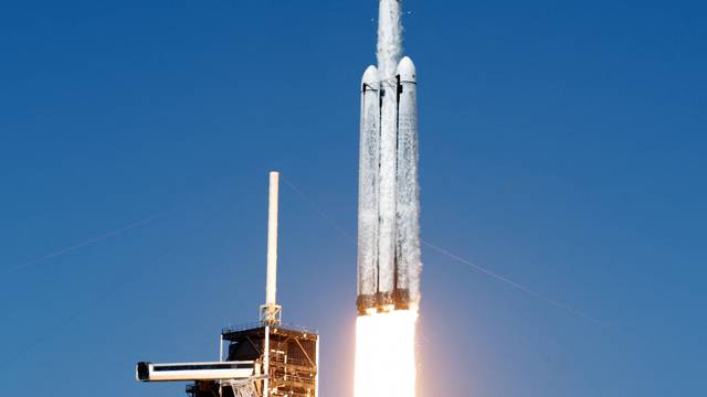 A SpaceX Falcon Heavy rocket is launched for the Europa Clipper mission to study one of Jupiter's 95 moons, at the Kennedy Space Center