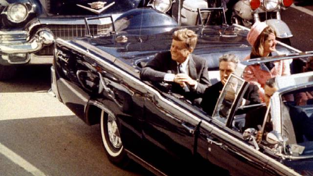 FILE PHOTO: U.S. President John F. Kennedy, First Lady Jaqueline Kennedy and Texas Governor John Connally ride  in a liousine moments before Kennedy was assassinated, in Dallas