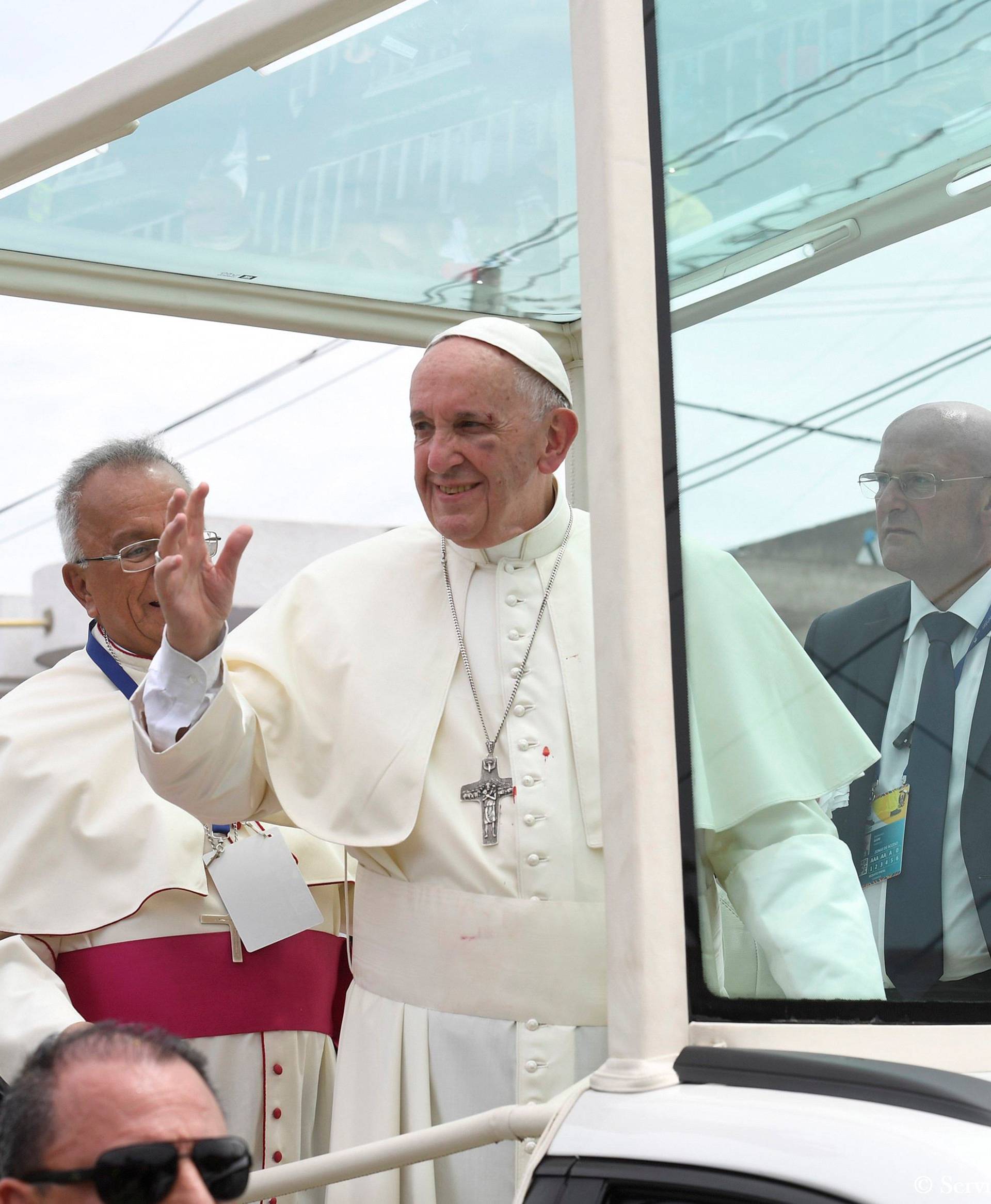 Pope Francis greets faithful from his popemobile in Cartagena
