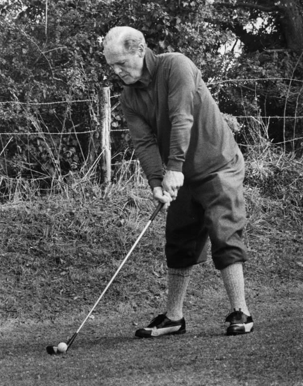 Sir Douglas Bader playing golf