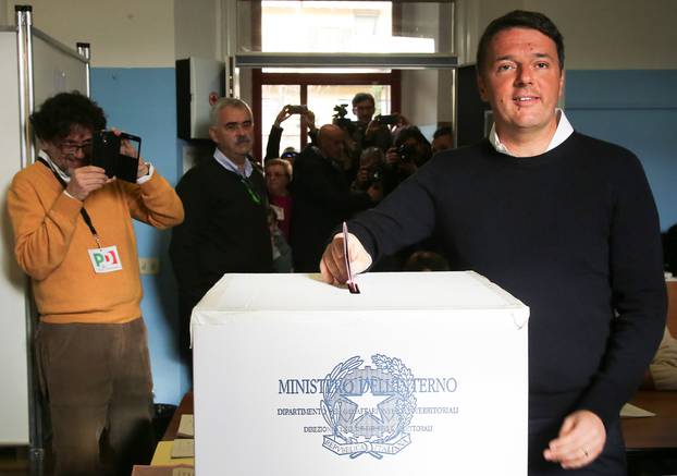 Italian Prime Minister Matteo Renzi casts his vote for the referendum on constitutional reform, in Pontassieve