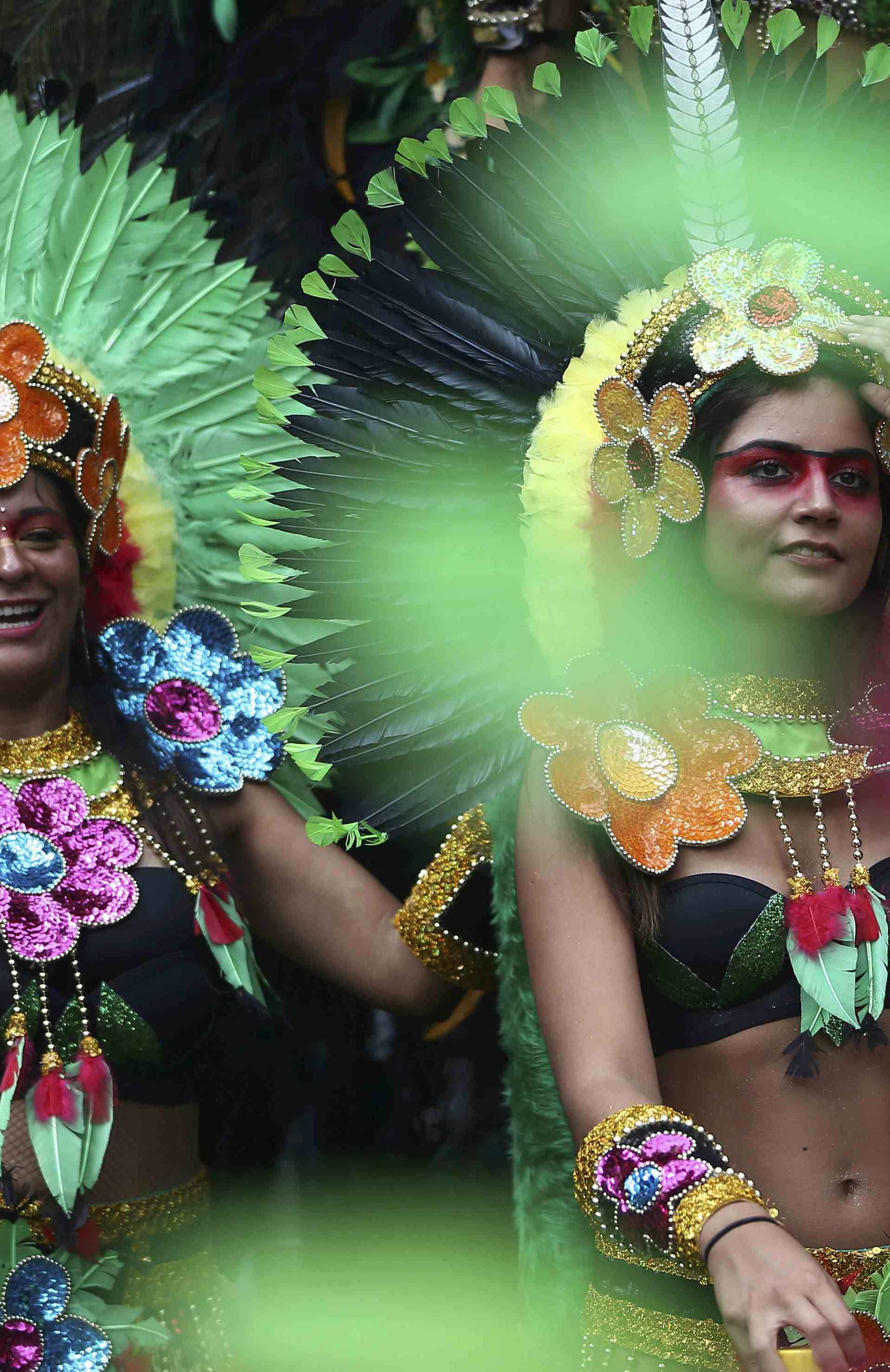 Performers participate in the parade at the Notting Hill Carnival in London