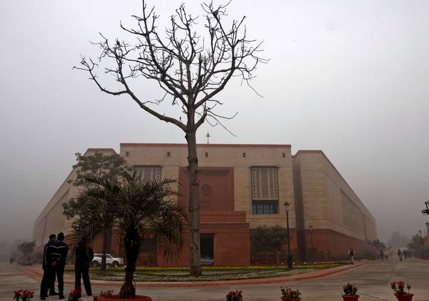FILE PHOTO: Police officers stand inside the parliament premises in New Delhi