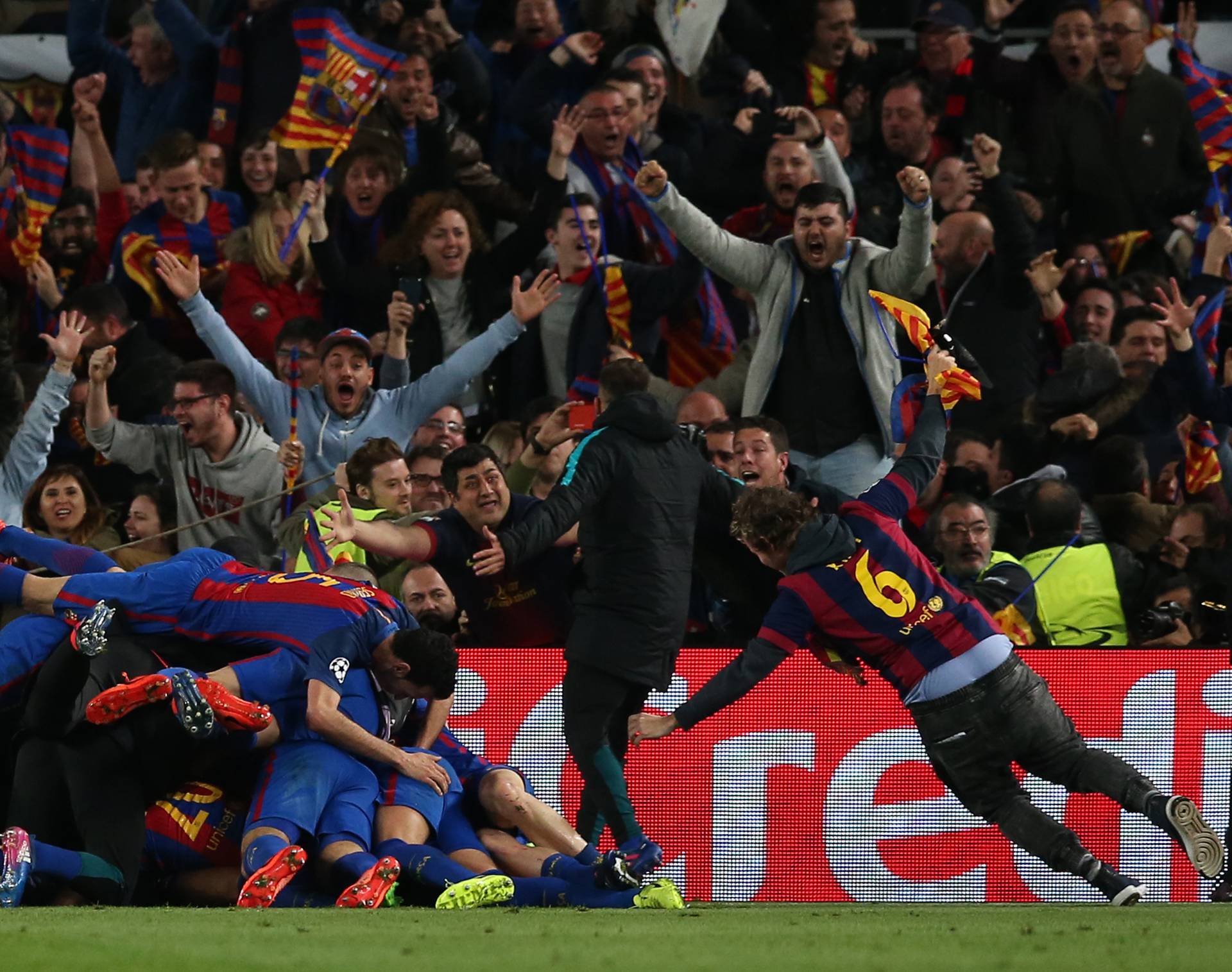 Barcelona's Sergi Roberto celebrates scoring their sixth goal with team mates and fans