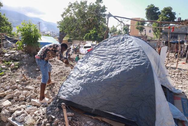Haitians displaced by gang violence take shelter in refugee camp, in Port-au-Prince