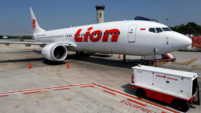 FILE PHOTO: Lion Air's Boeing 737 Max 8 airplane is parked on the tarmac of Soekarno Hatta International airport near Jakarta