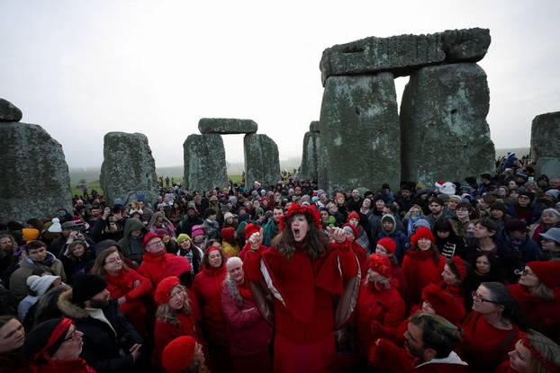 Winter solstice celebrations during sunrise at Stonehenge