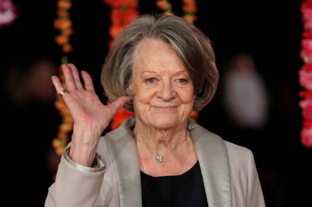 FILE PHOTO: Actress Maggie Smith arrives at the Royal Film Performance and world premiere of the film, "The Second Best Exotic Marigold Hotel", in London