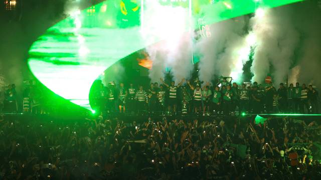 Sporting CP team celebrates with their supporters after winning the Portuguese League