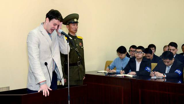 FILE PHOTO: KCNA picture shows U.S. student Otto Warmbier crying at court in an undisclosed location in North Korea