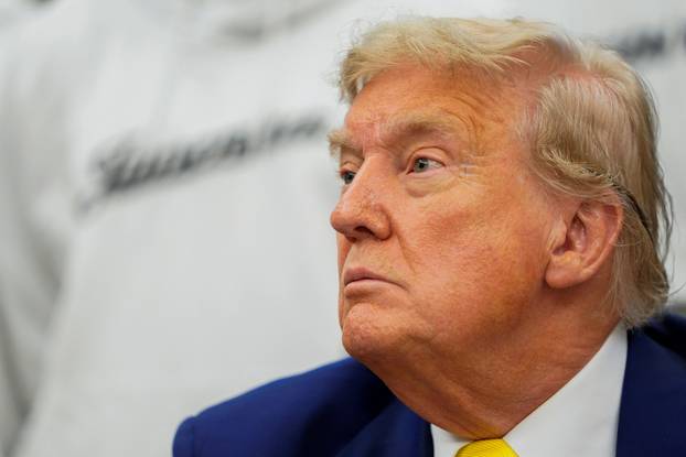 U.S. President Donald Trump meets with players of the Juventus soccer team at the White House in Washington