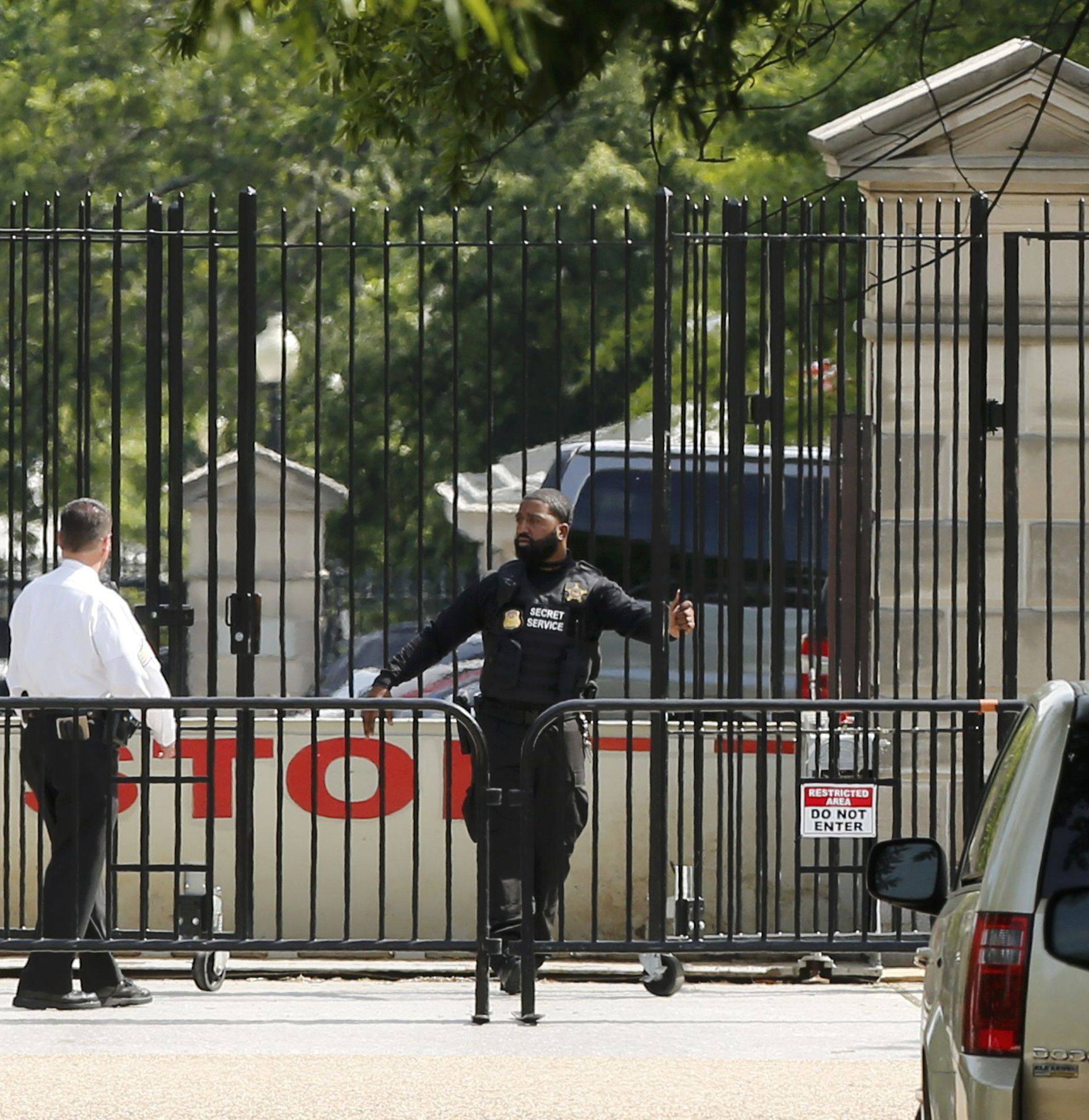 Police secure a location after a shooting near the White House in Washington DC
