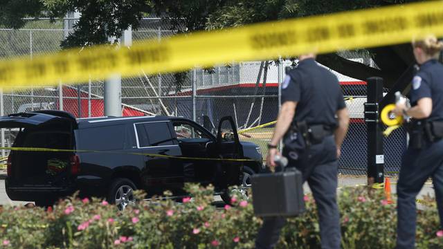 Police investigate shooting scene after a gunman opened fire on Republican members of Congress during a baseball practice near Washington in Alexandria, Virginia