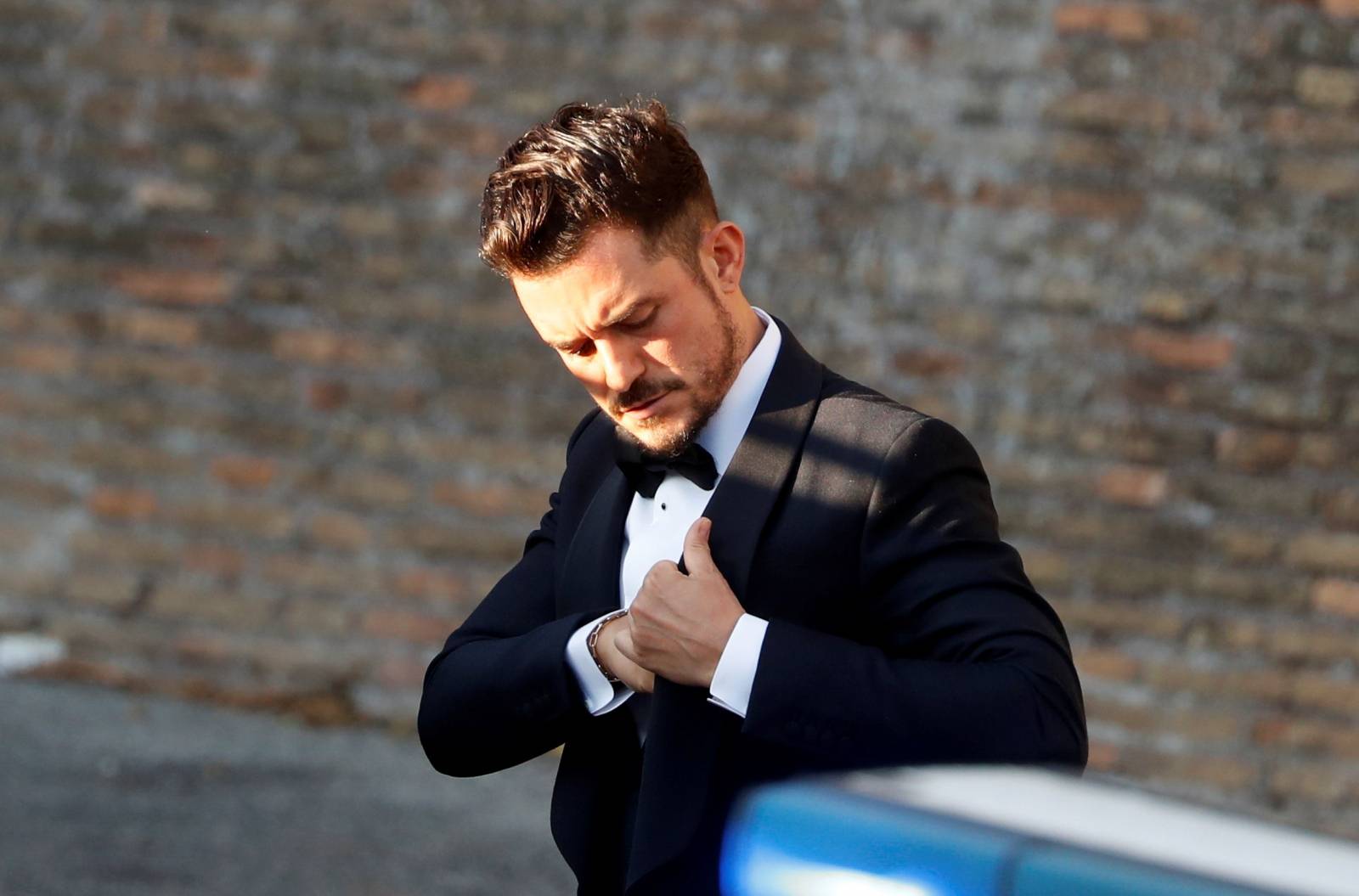 Actor Orlando Bloom arrives to attend the wedding of fashion designer Misha Nonoo at Villa Aurelia in Rome