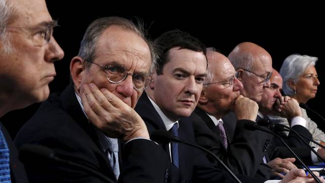 Gurria, Padoan, Osborne, Schaeuble, Sapin, Guindos and Lagarde attend a news conference at the IMF/World Bank Spring Meetings in Washington