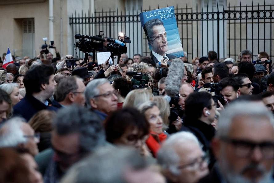 Former French President Sarkozy goes to jail to begin five-year sentence