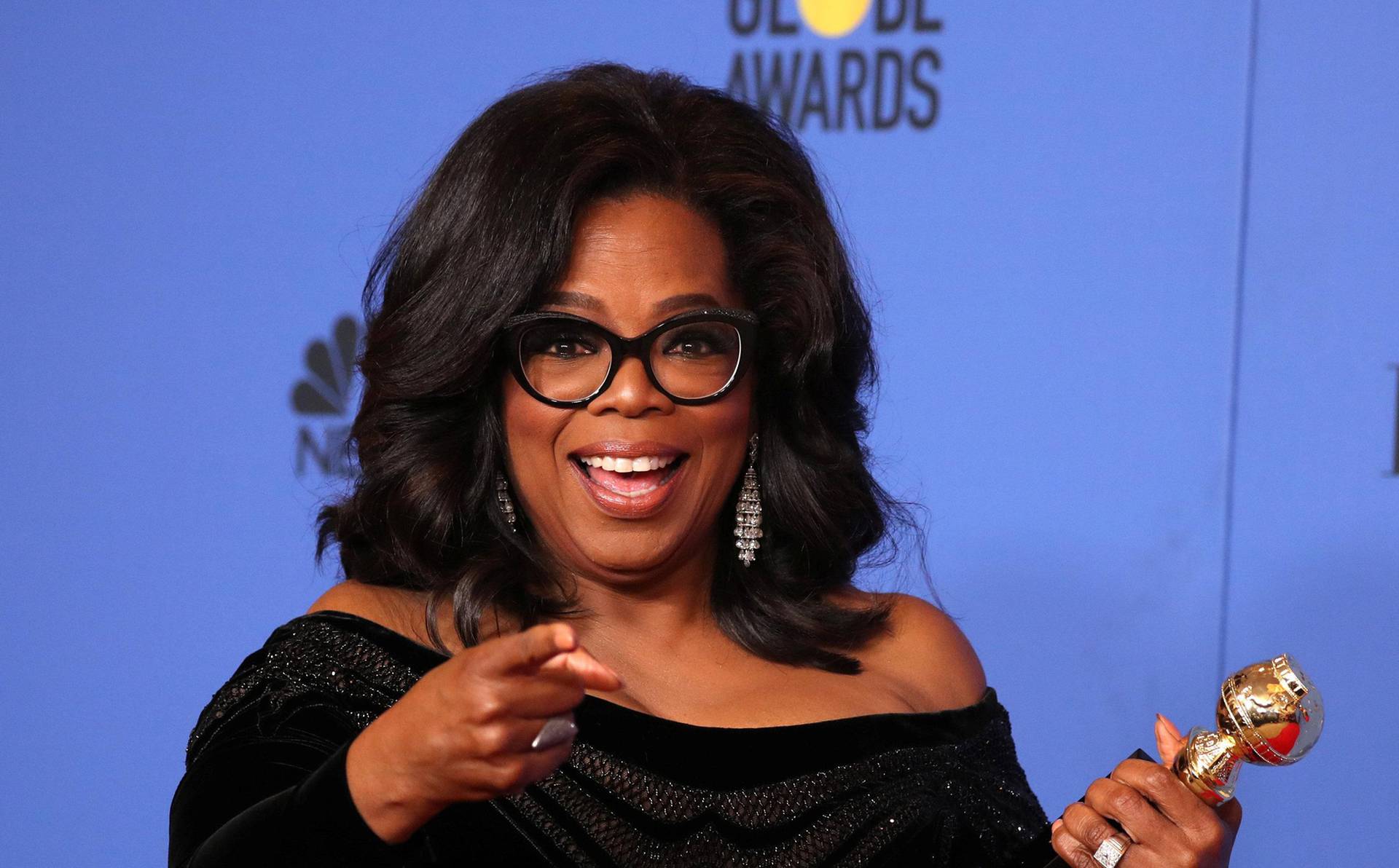 FILE PHOTO: Oprah Winfrey with her Cecil B. DeMille Award at the 75th Golden Globe Awards in Beverly Hills