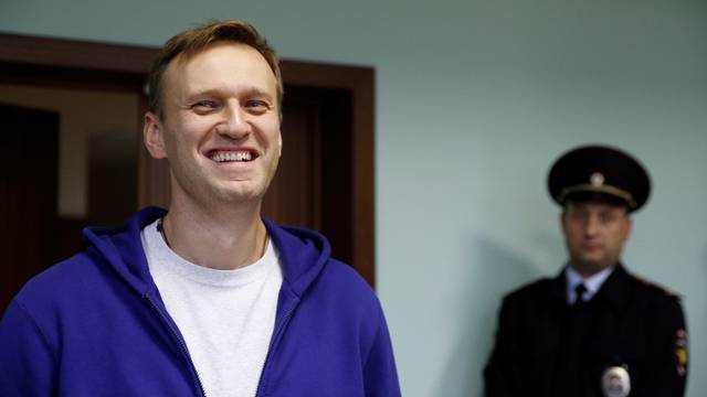 Russian opposition leader Alexei Navalny attends an appeal against his jail for repeatedly violating laws governing the organisation of public meetings and rallies, at Moscow city court in Moscow