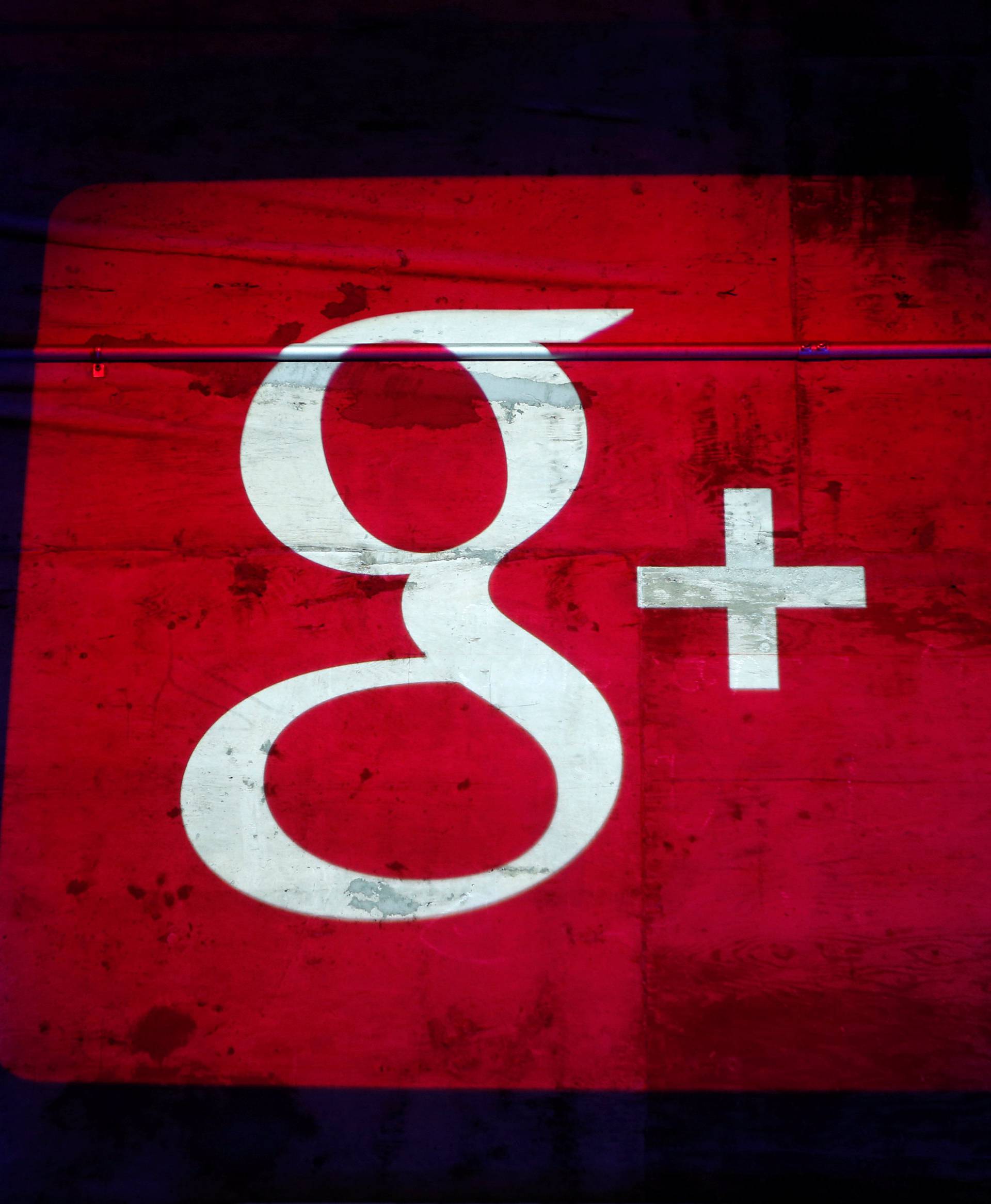 FILE PHOTO: Google Plus logo is projected on to the wall during a Google event in San Francisco