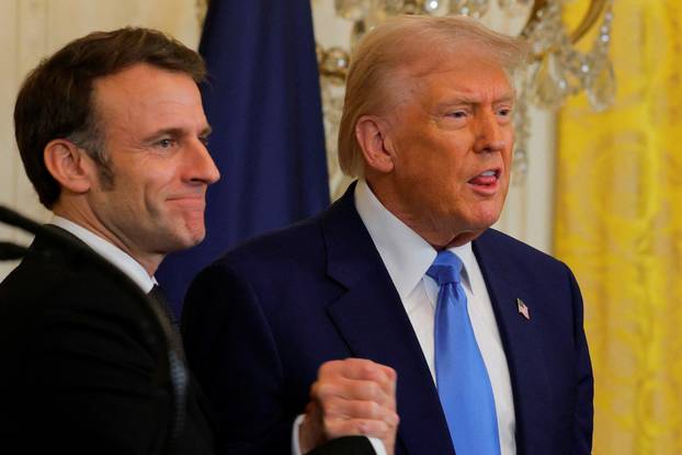 U.S. President Donald Trump and French President Emmanuel Macron attend a press conference at the White House in Washington