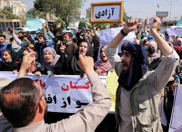 Afghan demonstrators shout slogans during an anti-Pakistan protest, near the Pakistan embassy in Kabul, Afghanistan