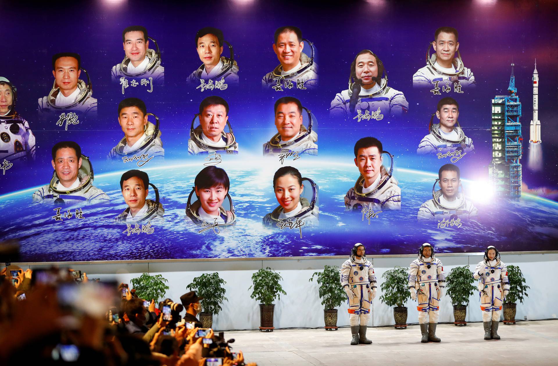 News conference before the launch of Long March-2F Y13 rocket, near Jiuquan
