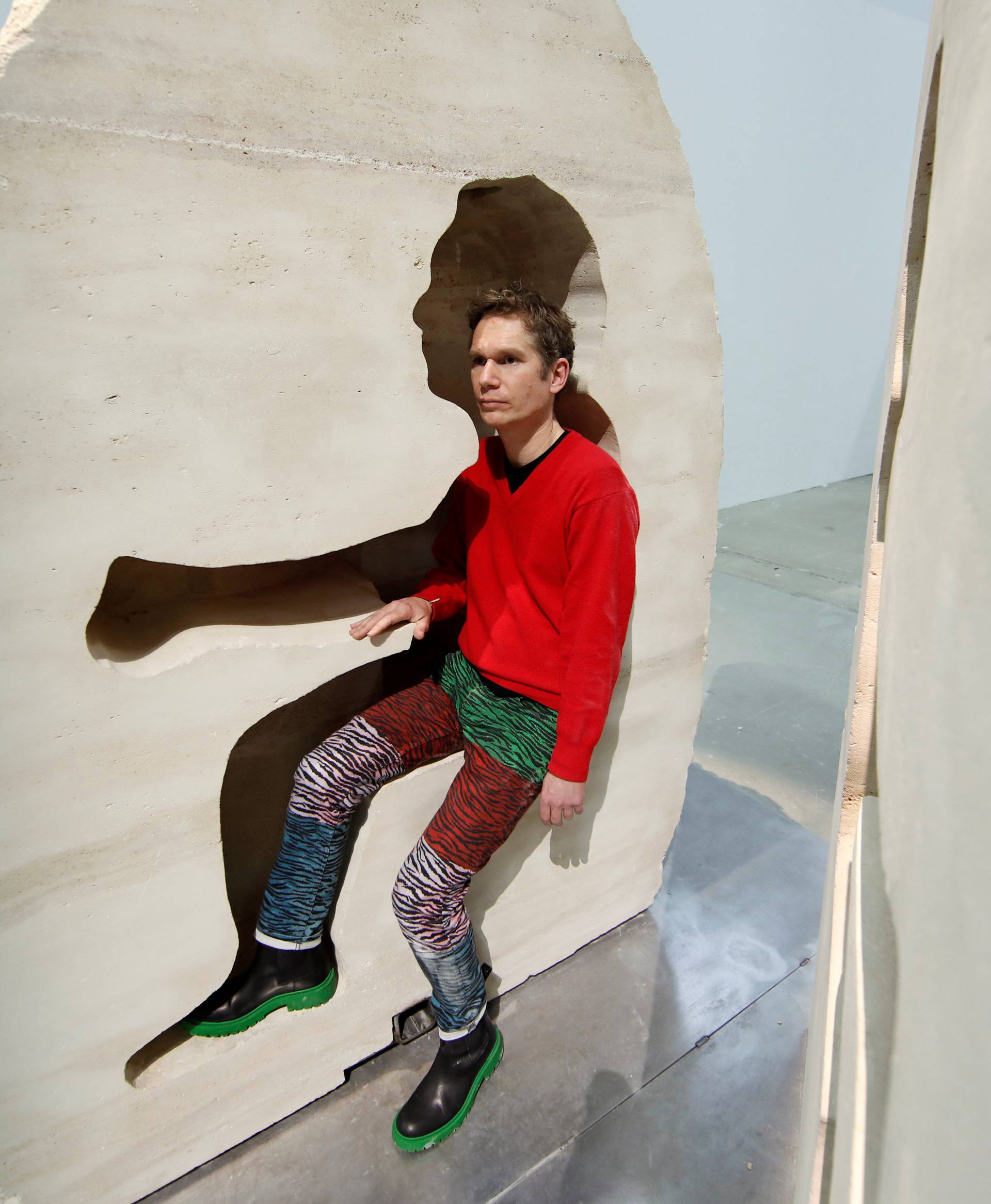 French artist Abraham Poincheval poses inside his artwork Pierre ("Stone") in Paris