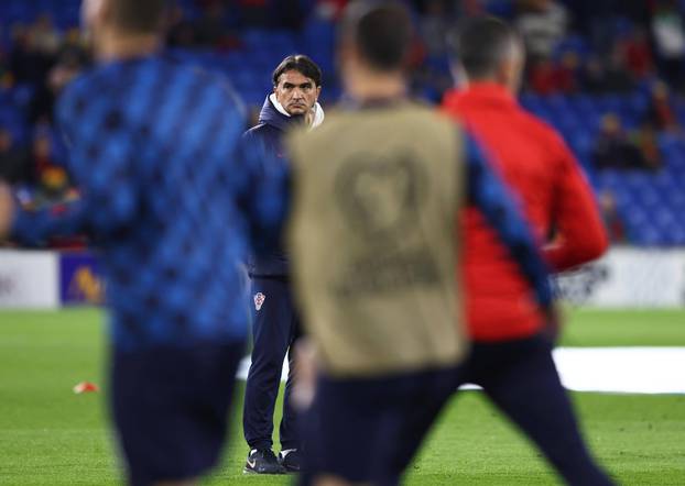 Cardiff, Wales, 15th October 2023. Croatia manager Zlatko Dalic watches his team warm up before the UEFA European Champi