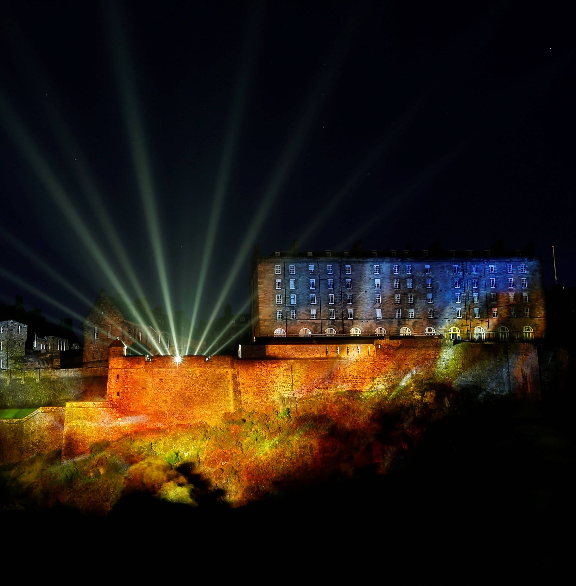 A digital light show called "Deep Time" is beamed onto Edinburgh Castle to mark the start of the Edinburgh Fringe Festival in Edinburgh