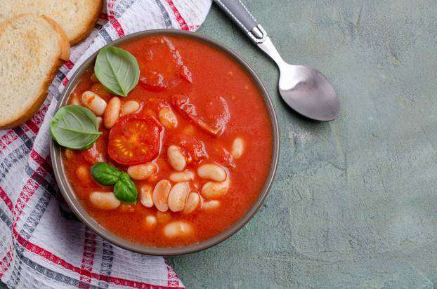 Thick,Tomato,Soup,With,Beans,In,A,Bowl,On,The