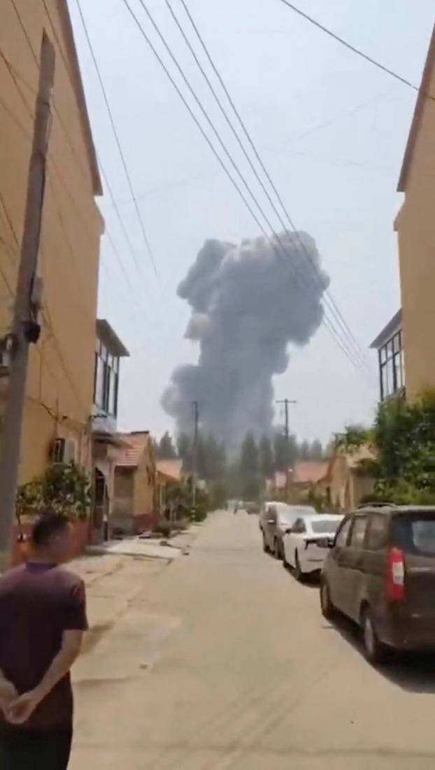 Smoke rises from an explosion in Gaomi