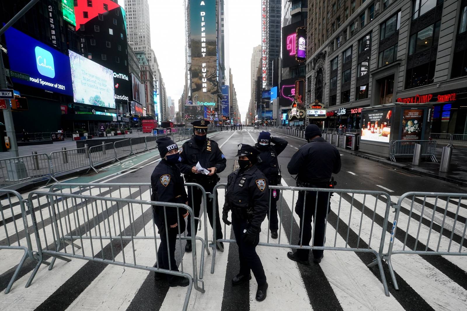 Police man checkpoints to prevent people from entering Times Square ahead of New Year's Eve