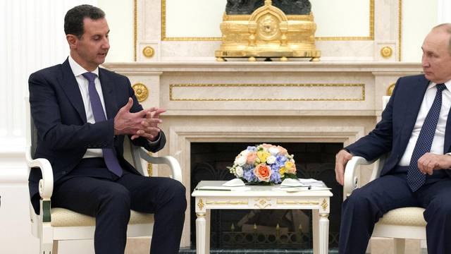 Russian President Vladimir Putin meets with Syrian President Bashar al-Assad in Moscow