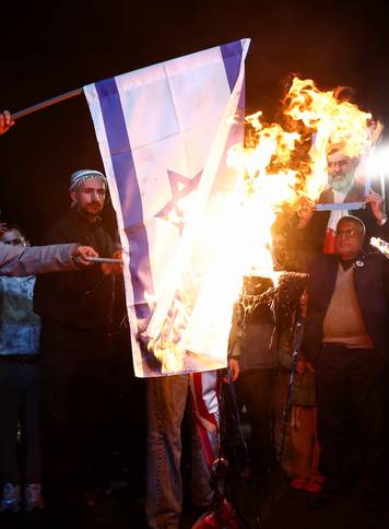People gather after a two-week ceasefire in the Iran war was announced, in Tehran