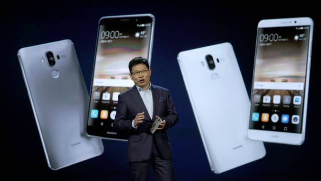 Richard Yu, Huawei CEO Consumer Business Group, talks about their Huawei Mate 9 smartphone just released to the U.S. market and displayed behind him during his keynote address at CES in Las Vegas
